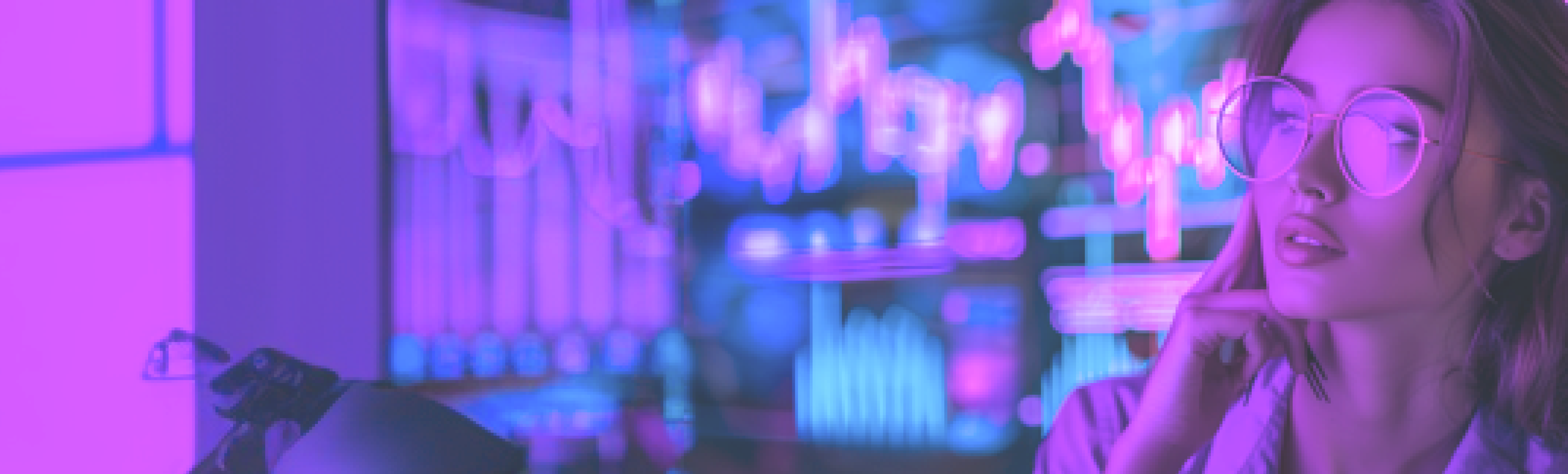 A woman in round glasses resting her chin on her hand in front of blurred violet trading charts