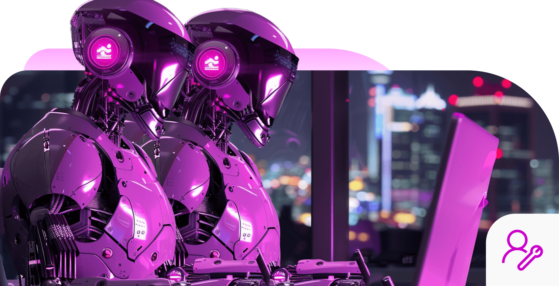 Two magenta robots side by side at a desk over a city at night, with a user-and-wrench badge in the corner