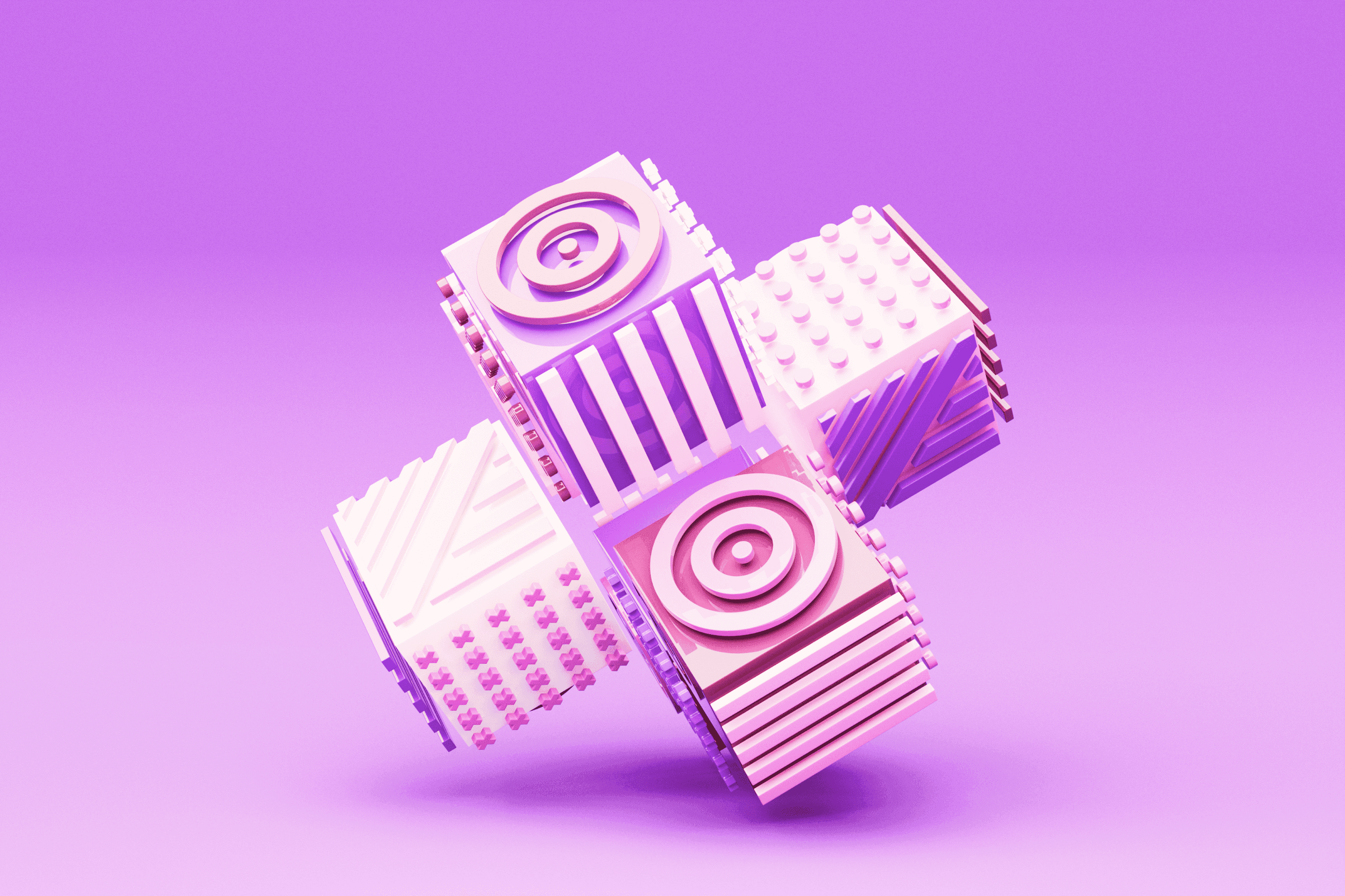 Interlocking 3D blocks in pink and violet with target patterns, on a purple ground